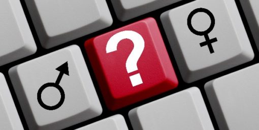 Clavier d'ordinateur avec signes masculin, féminin et point d'interrogation